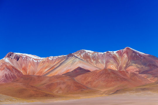Background with barren desert scenery in the Bolivian Andes, in the Nature reserve Edoardo Avaroa