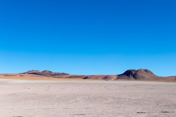 Background with barren desert scenery in the Bolivian Andes, in the Nature reserve Edoardo Avaroa