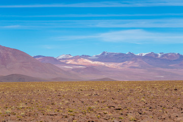 Background with barren desert scenery in the Bolivian Andes, in the Nature reserve Edoardo Avaroa