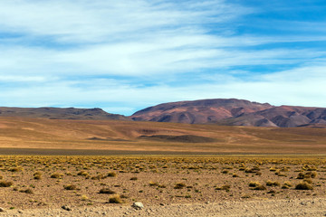 Background with barren desert scenery in the Bolivian Andes, in the Nature reserve Edoardo Avaroa