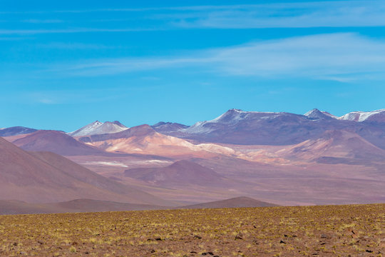 Background with barren desert scenery in the Bolivian Andes, in the Nature reserve Edoardo Avaroa