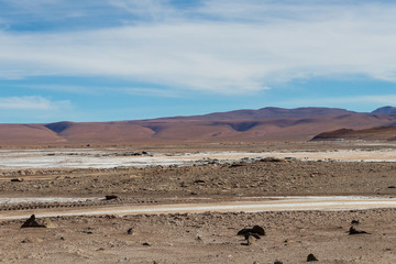 Background with barren desert scenery in the Bolivian Andes, in the Nature reserve Edoardo Avaroa