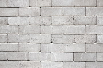 Old cinder block wall background, brick texture and background.