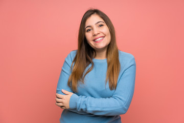 Obraz premium Young girl with blue sweater laughing