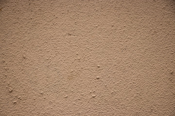 Beige painted grunge wall rough texture