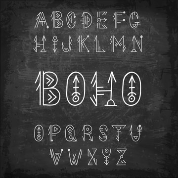 Tribal alphabet. Hand-drawn vector ethnic font. Boho style letters on chalk board.