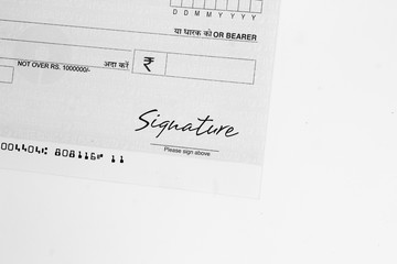 Cheque book and signature. indian cheque book with rupees symbol. color check book.