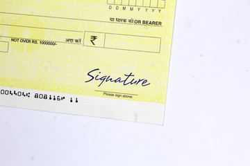 Cheque book and signature. indian cheque book with rupees symbol. color check book.