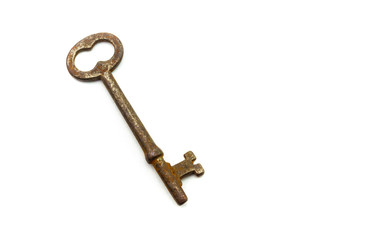 Old, rusty antique key on white background