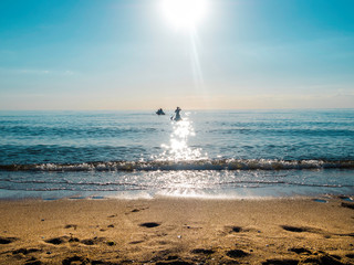 SAP surfing, a people is floating on a Board on the water, an active lifestyle, catamaran and board