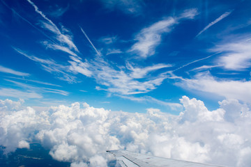 Puffy Clouds on Blue Sky Background