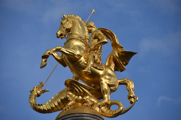 Fototapeta na wymiar Monument of St George Slaying Dragon, Full Low-Angle, Tbilisi, Georgia