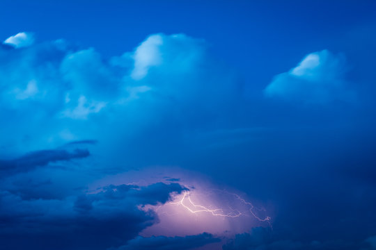 Thunderstorm and clouds on a summer evening