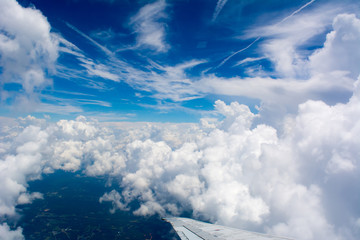Fototapeta premium Puffy Clouds on Blue Sky Background