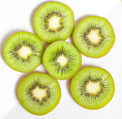 Kiwi slices on white background