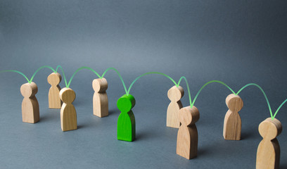 The green figure of a person unites other people around him. Social connections, communication....