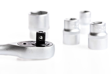 socket wrench isolated on white background. Taking care. Ratchet (Socket Wrench) Isolated on White. perfect tool kit. metalworking hand tool. metallic socket wrench or spanner