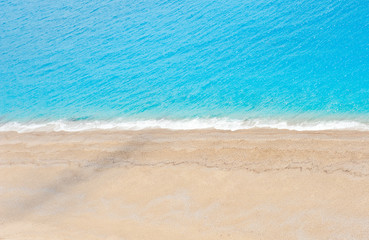 Fototapeta na wymiar Blue sea on the Milos beach in Lefkada island, Greece.