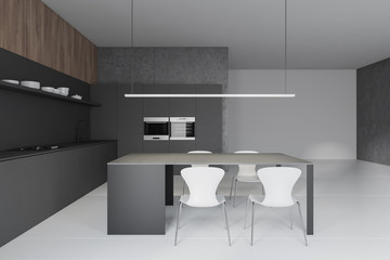 Fototapeta na wymiar Gray and white kitchen interior with table