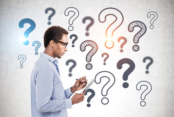 African American man and question marks