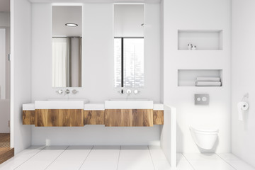 Fototapeta na wymiar White bathroom with double sink and toilet
