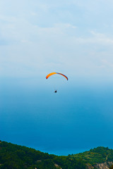 Paragliding in the sky. Extreme sport. Rachi village. Lefkada. Greece.