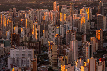 Obraz premium Benidorm skyscraper in sunset lights, Alicante province, Spain