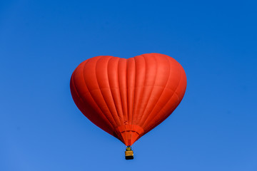 balloon heart on blue sky background symbol of love and romance