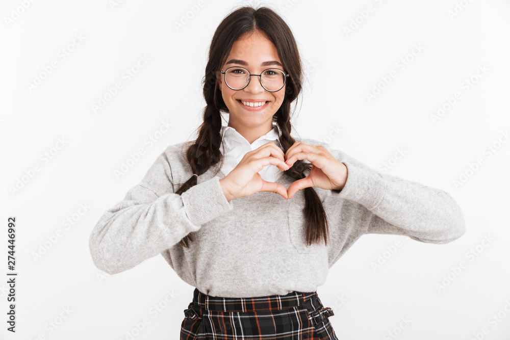 Sticker photo closeup of caucasian teenage girl wearing eyeglasses and school uniform smiling while showing 