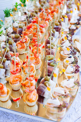 Beautifully decorated catering banquet with different food snacks and appetizers