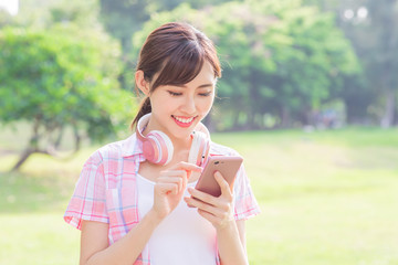 young asian woman use phone