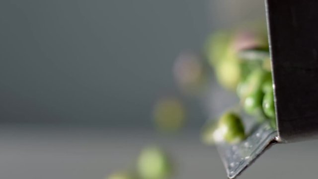 Mediterranean tradition. Extra virgin olive oil.Olive falling in the crusher