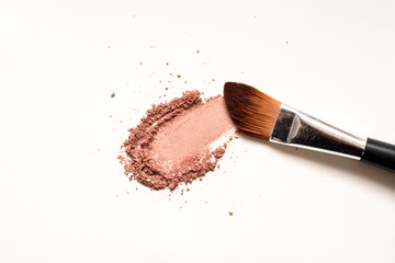 Make up brush with selection of colored make up powder