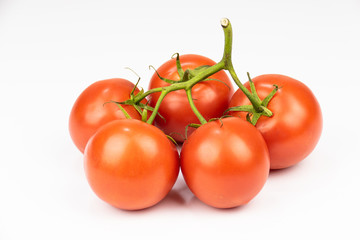 bunch of tomatoes isolated on white background