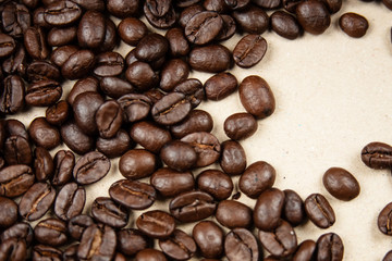 Closeup group of coffee bean on background,blurry light around