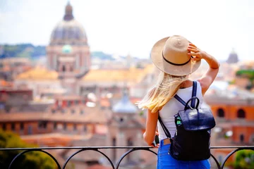 Cercles muraux Rome Rome Europe Italia travel summer tourism holiday vacation background -young smiling girl with mobile phone camera and map in hand standing on the hill looking on the cathedral Vatican