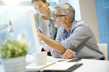 Informal coworkers working together in contemporary office