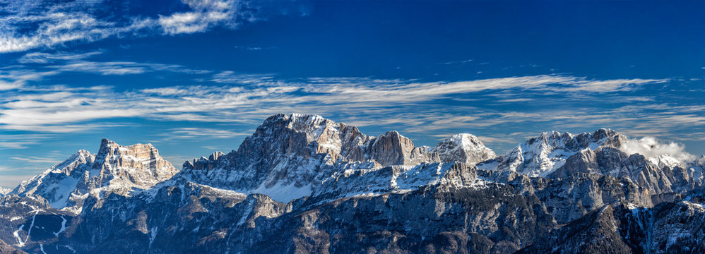 Panoramic view of snowy Dolomites mountains in Italy, Civetta ski resort and Monte Pelmo in background