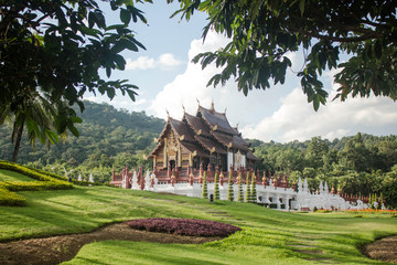 Fototapeta na wymiar Ho Kham Luang pavilion, know as Grand Pavilion, surrounded by gardens and trees at Royal Park Rajapruek, Chiang Mai