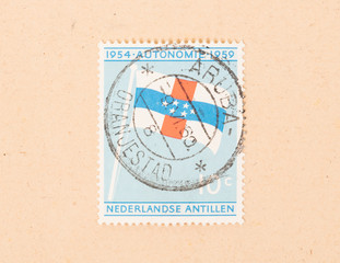 DUTCH ANTILLES - CIRCA 1959: A stamp printed in the Dutch Antilles shows a flag, circa 1959