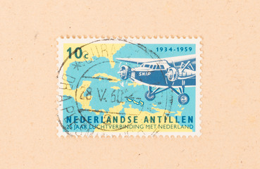 DUTCH ANTILLES - CIRCA 1960: A stamp printed in the Dutch Antilles shows the airservice in the Dutch Antilles, circa 1960