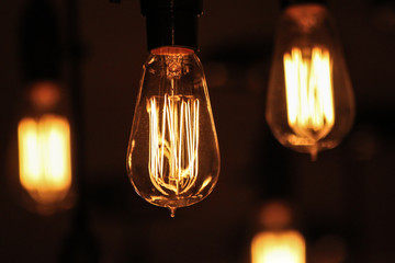 industrial lightbulbs in a restaurant or bar - 274457527