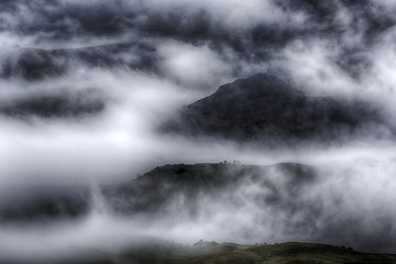 View of the foggy valley in Sierra Nevada de Santa Marta, Cordillera, Colombia  dramatic scene, beautiful world,scenic view with cloudy sky, majestic impressive dawn in mountain landscape, wallpaper