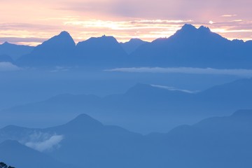 View of the foggy valley in Sierra Nevada de Santa Marta, Cordillera, Colombia  dramatic scene, beautiful world,scenic view with cloudy sky, majestic impressive dawn in mountain landscape, wallpaper