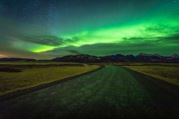 Fototapeta premium Aurora in Iceland in November show lights northern road