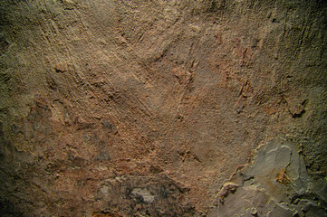 Grey rusty yellow background with plaster texture on the wall. Matte rough wall background close-up texture. Concrete, Grunge.