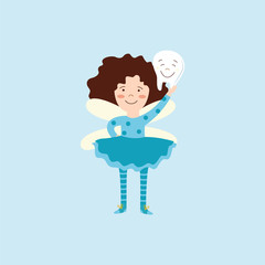 Child tooth fairy holding a smiling tooth