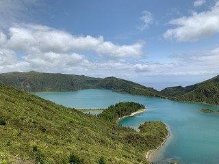 Fototapeta na wymiar landscape with lake and mountains on São Miguel island, Azores, Portugal near Lagoa do Fogo