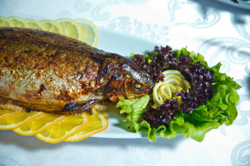 Laced l faith, greens, spanag, basil. Fried fish in the oven.
