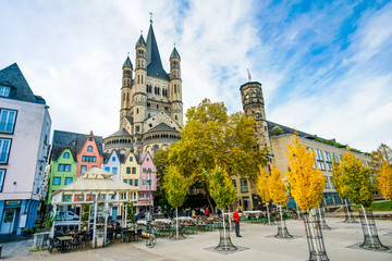 COLOGNE - NOVEMBER 07, 2018 : Colorful houses in front of St. Martin's church on november 07, 2018...